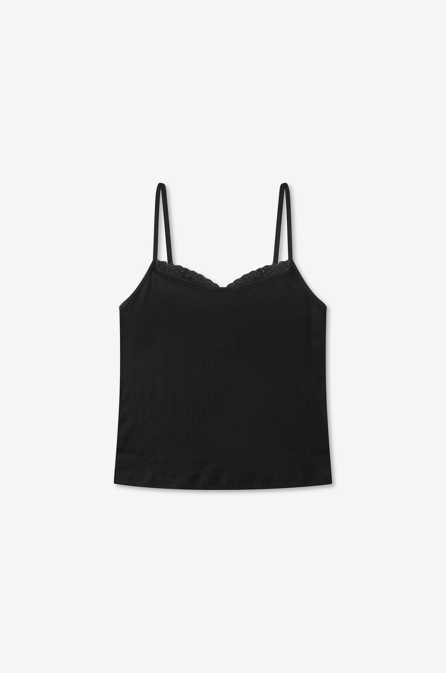 Joan Tank - Black by 0 is a black ribbed pointelle camisole with thin adjustable straps, a scalloped neckline, and a fitted silhouette, displayed on a plain white background.