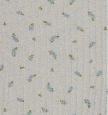 Introducing the Lera Brief - Blue Floral by Juem: featuring light beige fabric with a subtle vertical ribbed texture, adorned with small blue flower buds and delicate green leaves in a repeating pattern. This brief showcases a 90's style, high-cut fit for cheeky coverage.