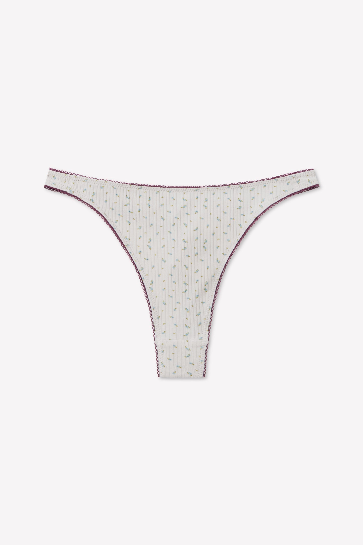 Bonnie G String - Blue Floral by 0, featuring a delicate blue floral pattern and designed with a high-cut silhouette for an elongating effect, showcased against a plain white background.