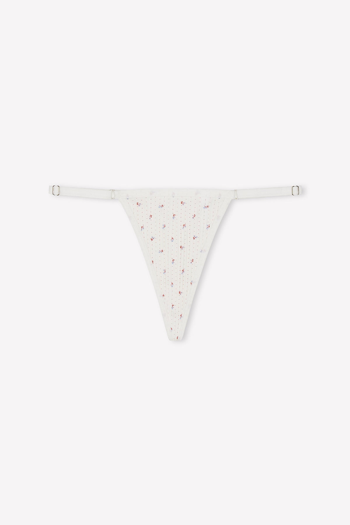 The Harri Brief - Flora is a white ribbed G-string thong with a subtle floral pattern, adjustable thin side straps, and stretch cotton fabric, shown on a plain white background.