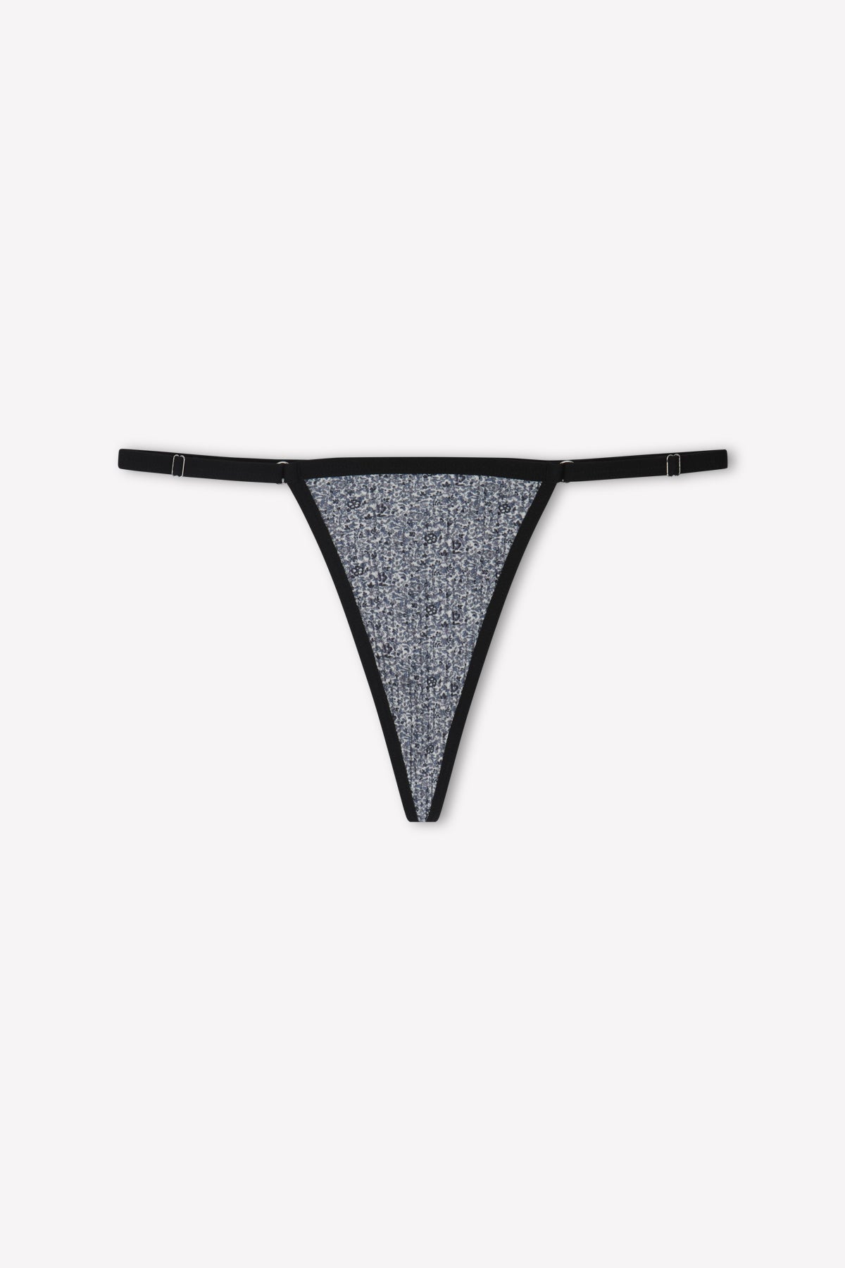 The Harri G-string in Midnight Floral by Juem on a white background.