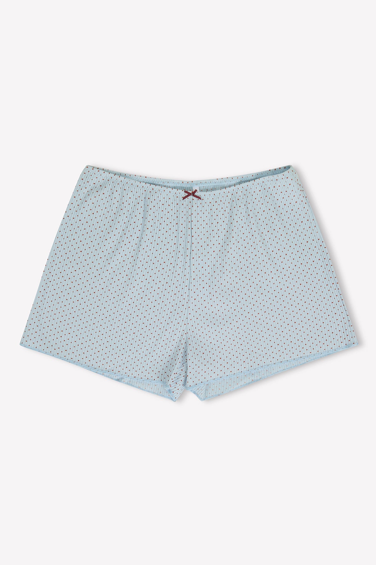Drew Short - Polka by 0: Light blue men's boxer shorts in organic cotton with a small dark polka dot pattern, elastic waistband, and decorative front bow, shown on a white background.