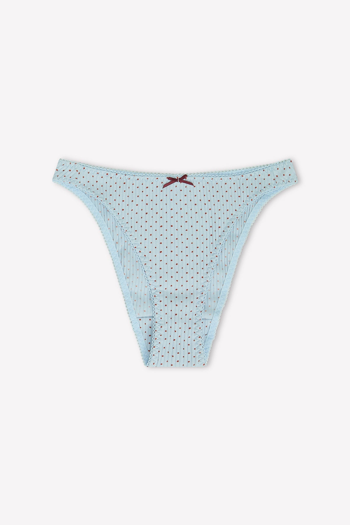 The Lera Brief - Polka by 0 is a light blue women’s high-cut cotton underwear with thin red polka dots, vertical white stripes, scalloped edges, and a small red bow at the center waistband, shown on a white background.