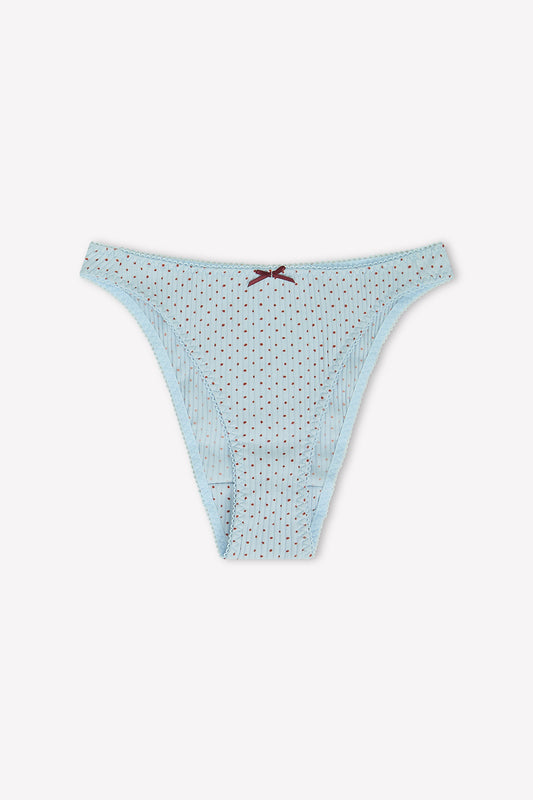 The Lera Brief - Polka by 0 is a light blue women’s high-cut cotton underwear with thin red polka dots, vertical white stripes, scalloped edges, and a small red bow at the center waistband, shown on a white background.