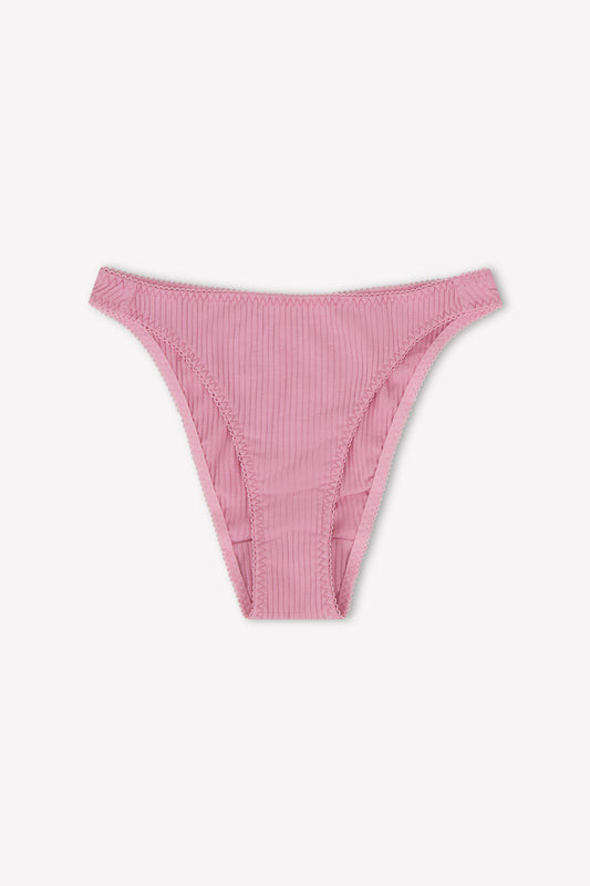 The Lera Brief by 0 is a pair of fuchsia ribbed cotton bikini-style underwear in a high-cut fit, shown laid flat on a white background.