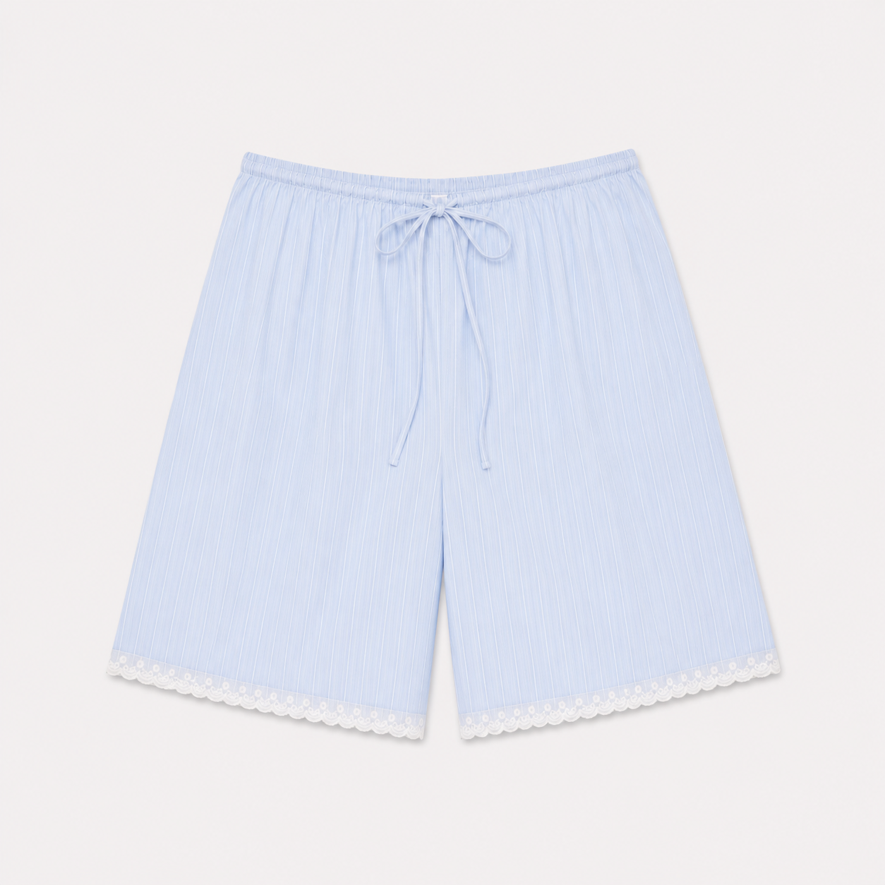 The Mae Short - Cloud Stripe by 0 features light blue, knee-length organic cotton with white pinstripes, an elastic drawstring waistband, and white lace trim at the hem. Shown laid flat on a white background.